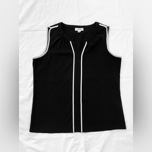 Although you are an elegant Calvin Klein top it is time to go to your new owner